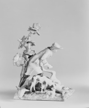 Porcelain statuette, huntsman and hind