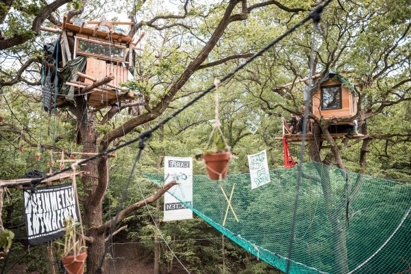 A stretch of forest occupied since 2012 on the boundary with the Hambach open-pit mine. Over the years elaborate structures have been built there, featuring suspension bridges, solar panels, and heating stoves. A new generation of interconnected tree houses were built after the site was cleared in 2018.
